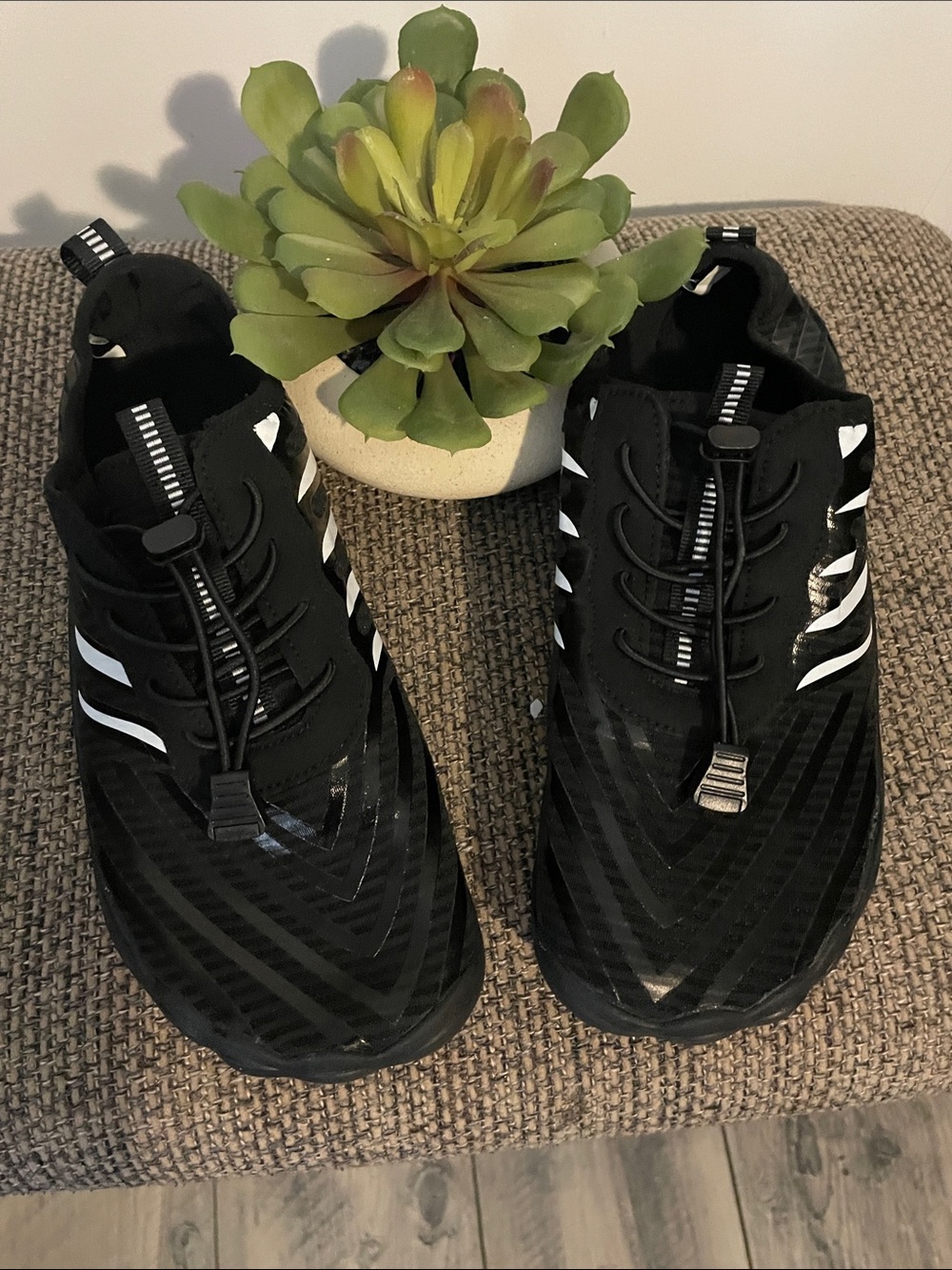 Black Athletic Slip-On Sneakers with White Accents